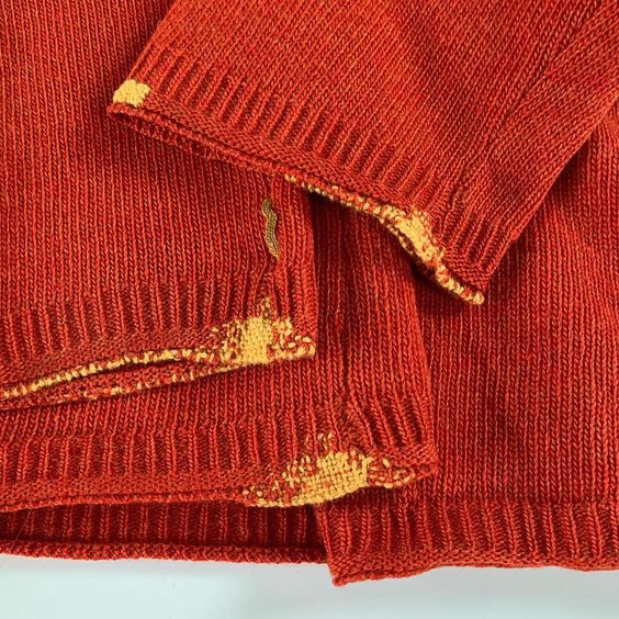 Mended red jumper